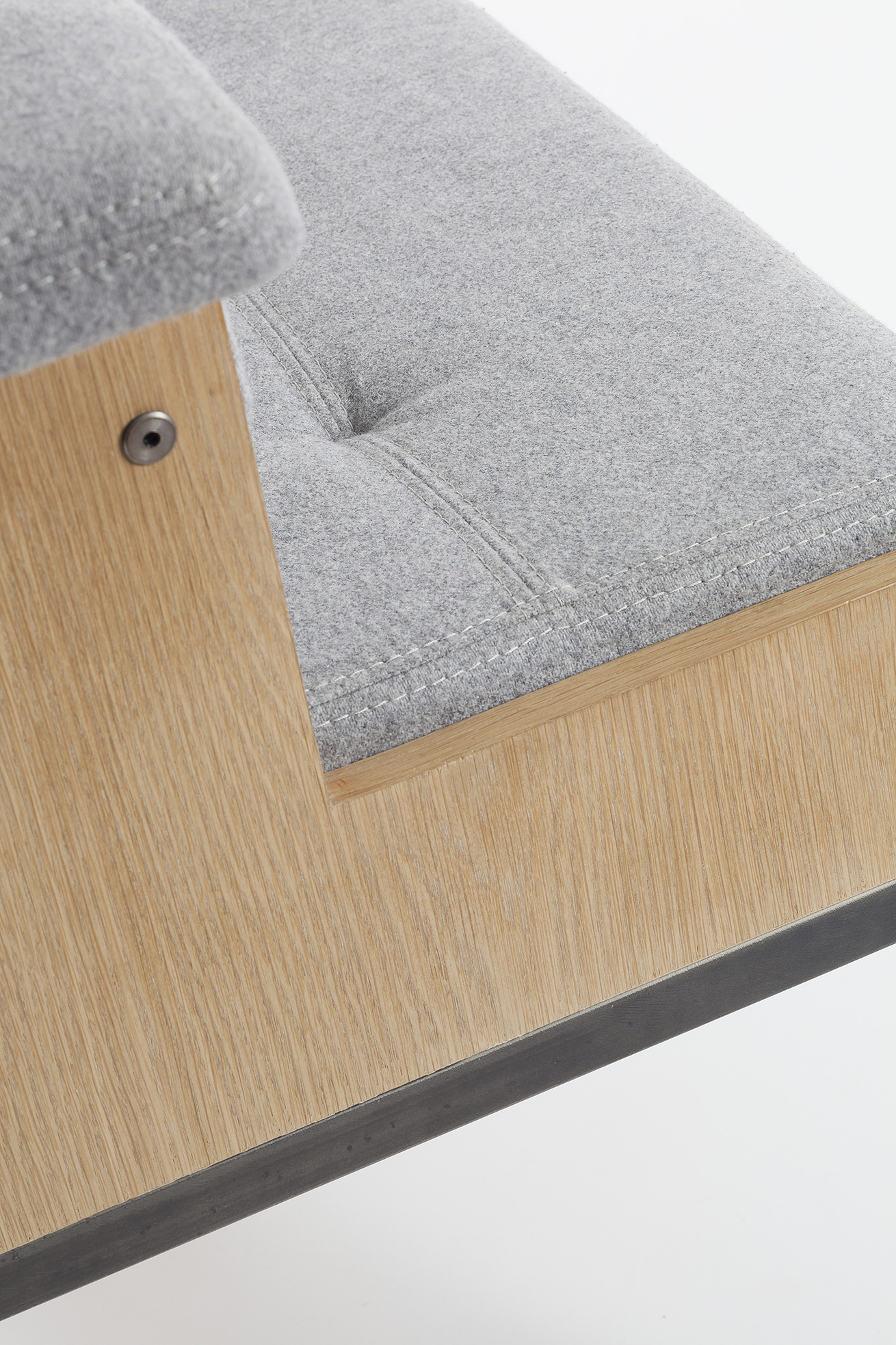 Designer lounge chair in felt and wood