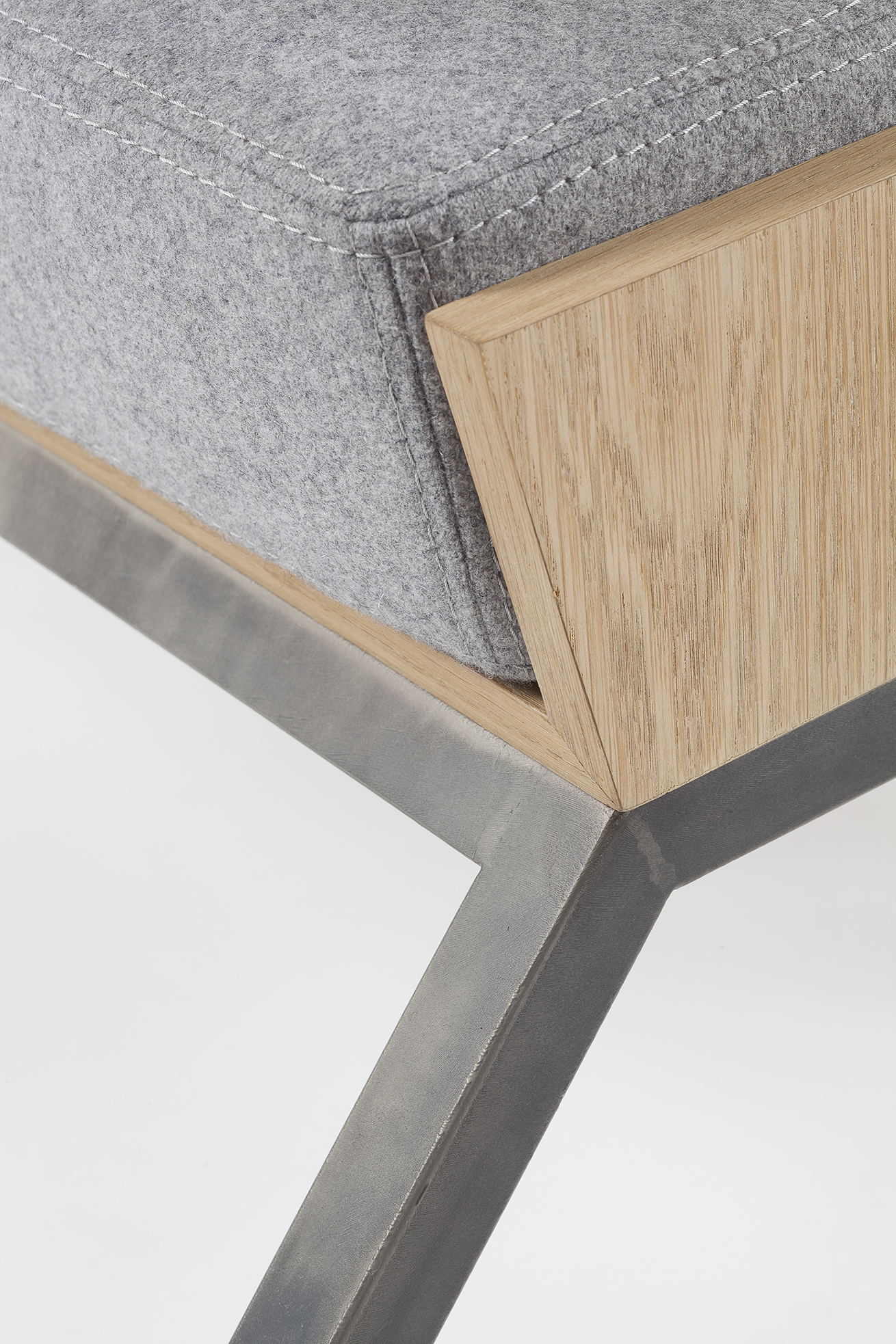 Designer lounge chair in felt and wood