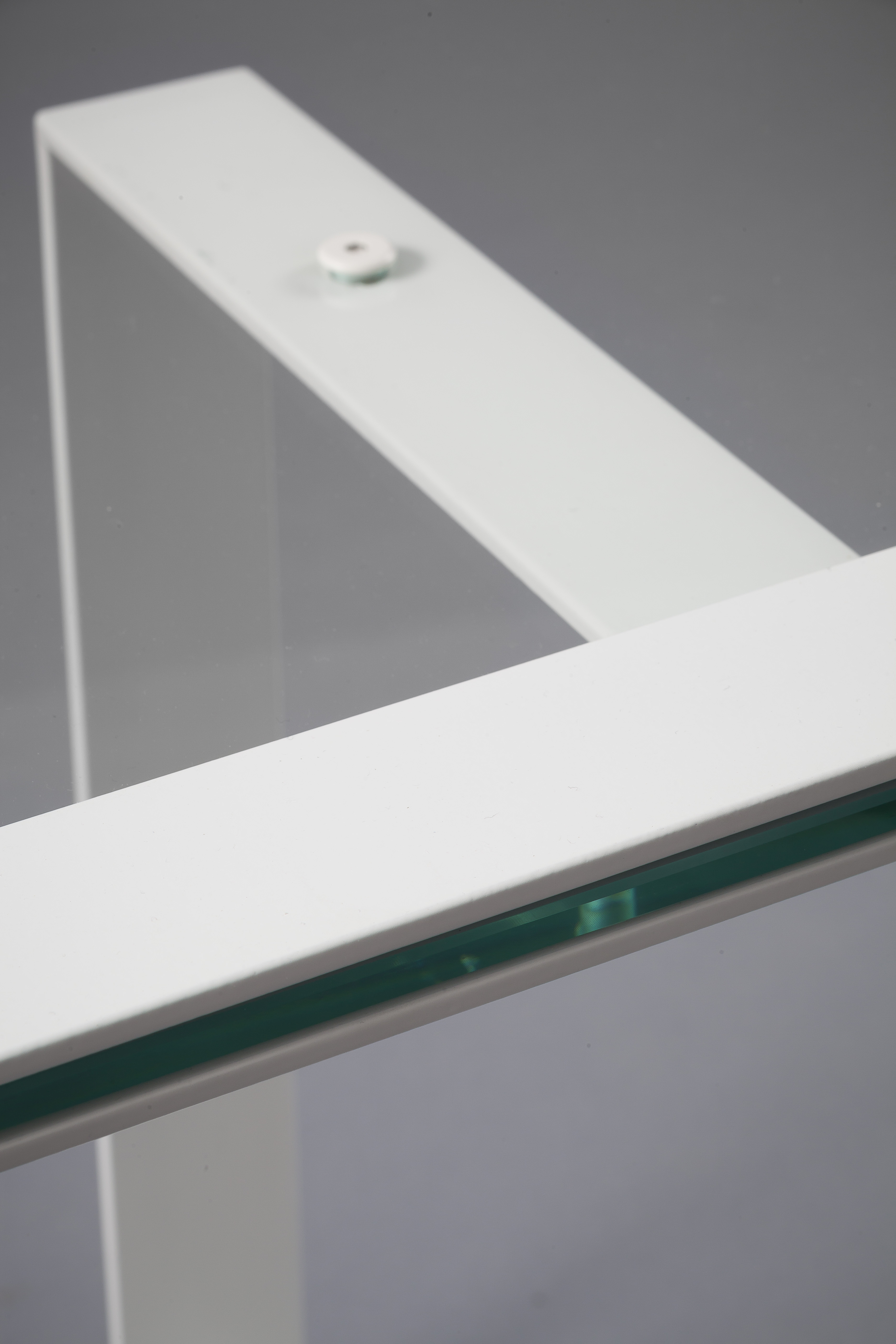 Coffee table in glass and metal