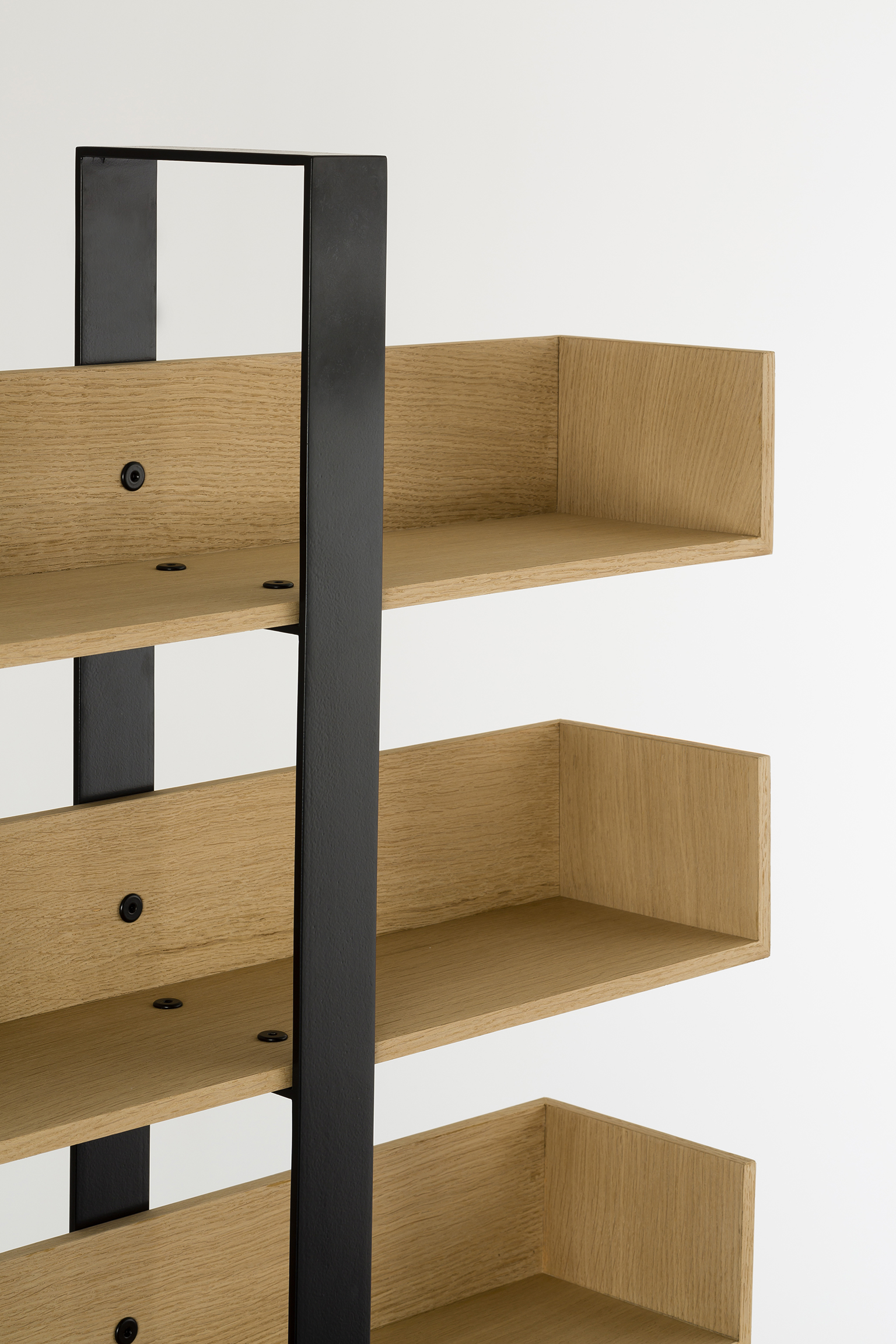 Designer bookshelf in wood and metal
