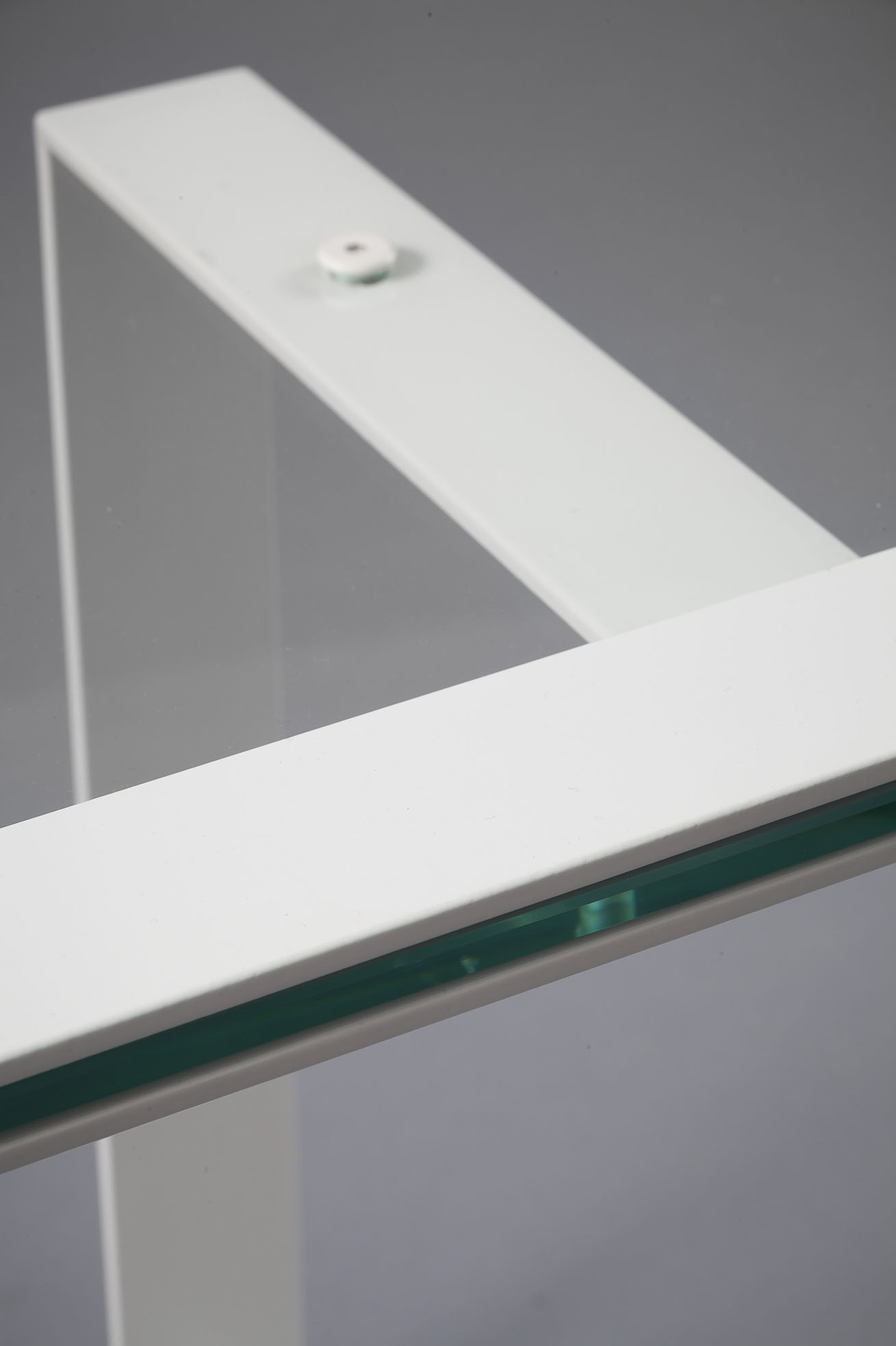 Coffee table in glass and metal