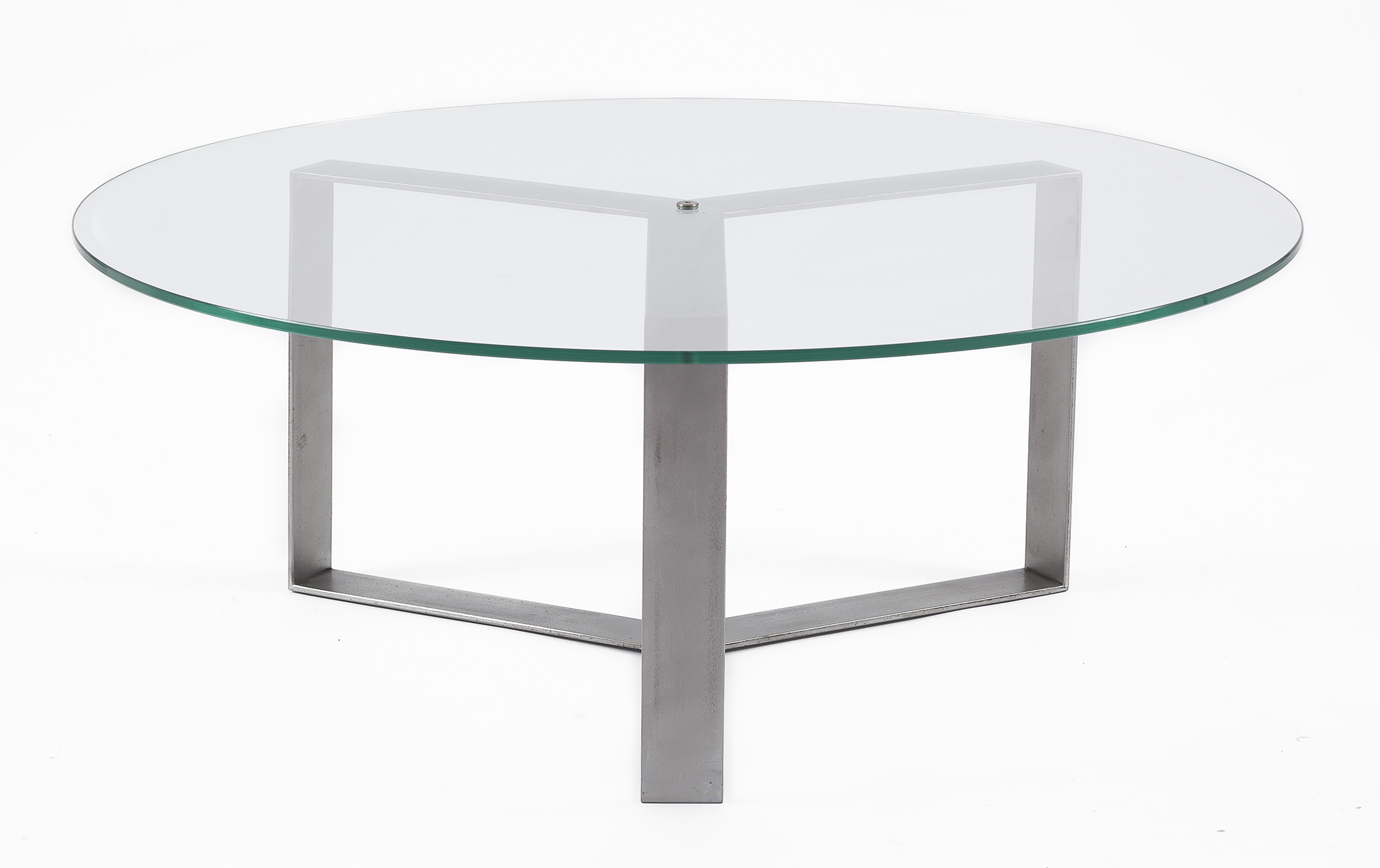 Round coffee table in metal and glass