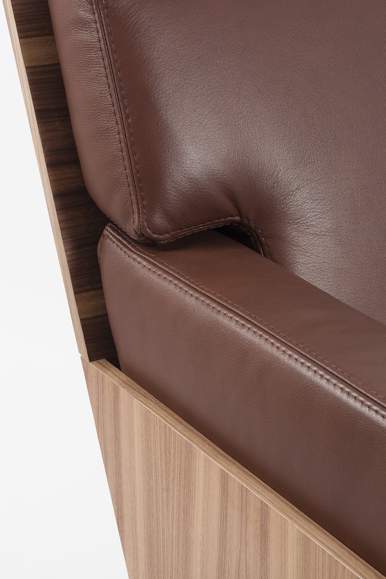 Armchair in leather and wood