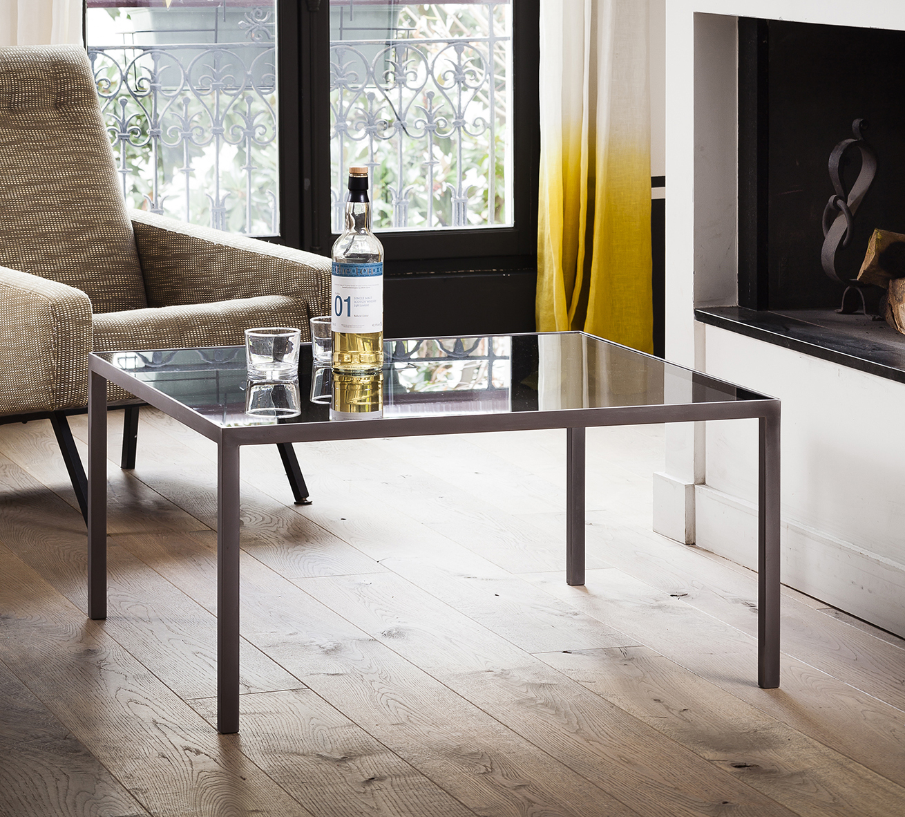 Table Basse design verre teinté et métal brossé Vaneau