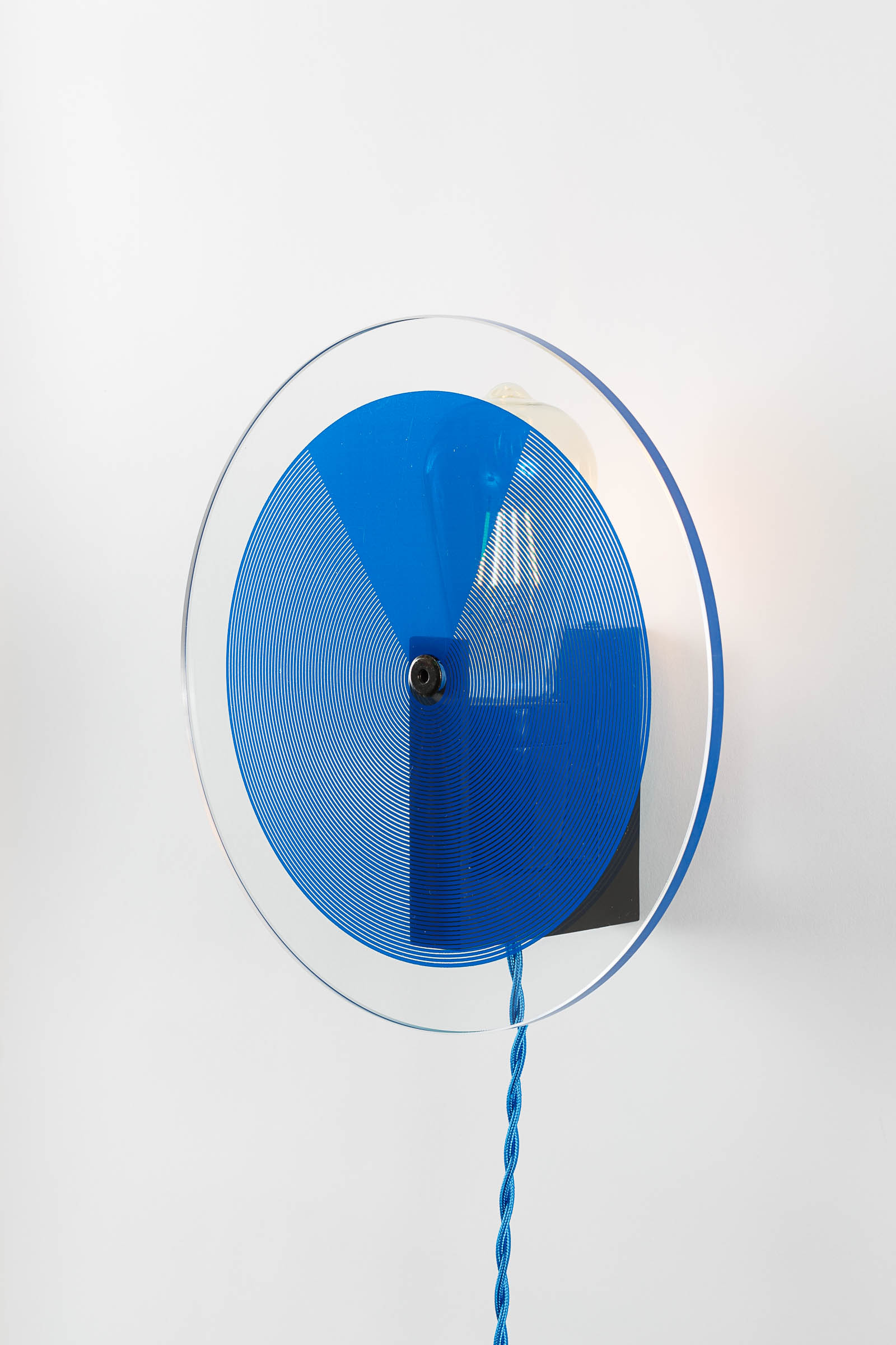 Designer wall-lamp in glass and mat black steel by Alex de Rouvray